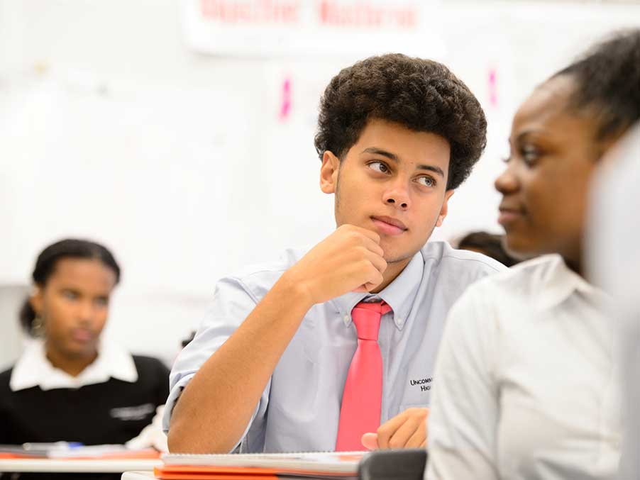 Teen boy sitting in a classroom